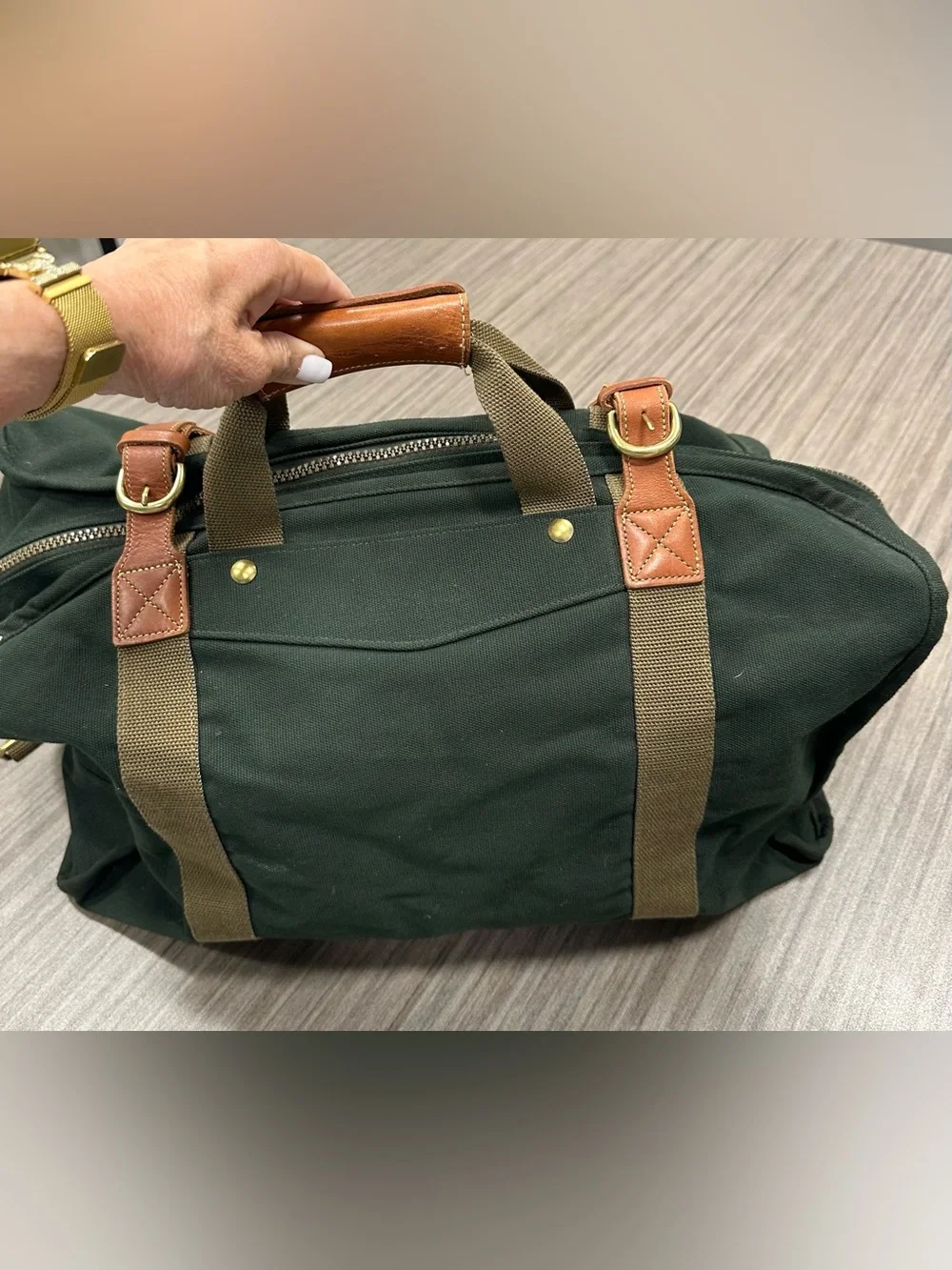 Tumi Dakota Dark Green Canvas Duffel with Tan Straps and Brown Leather Trim